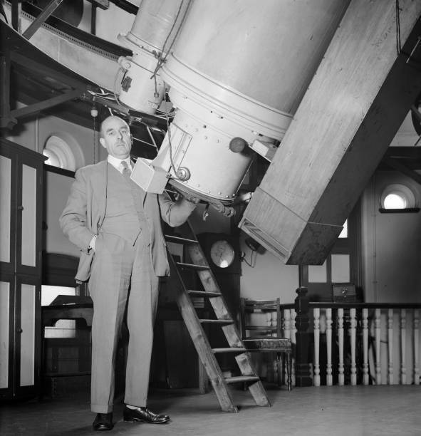 Royal Astronomer, Dr Harold Spencer Jones standing next to a giant- 1930s Photo