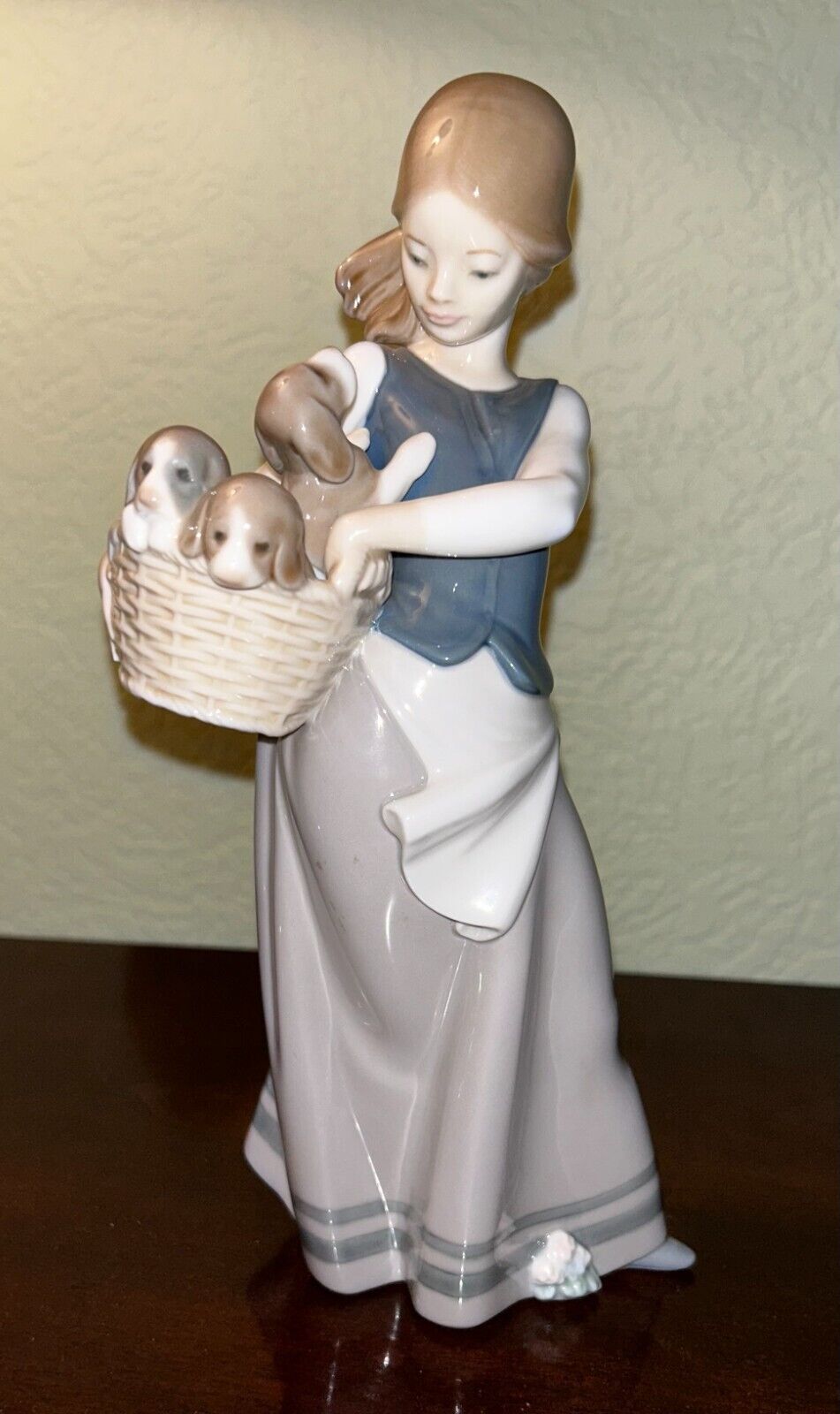 Lladro Figurine 1311 Girl With Basket of Puppies on Hip Retired 1977. No Box