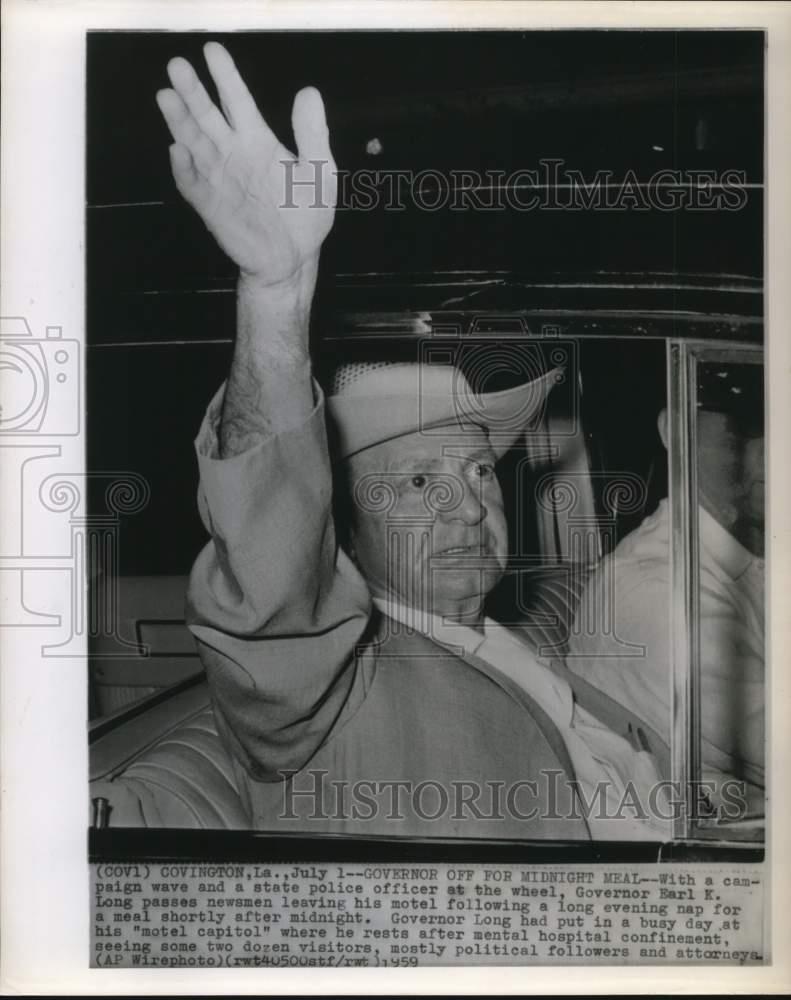 1959 Press Photo Governor of Covington, Louisiana Earl K. Long Waving from Car