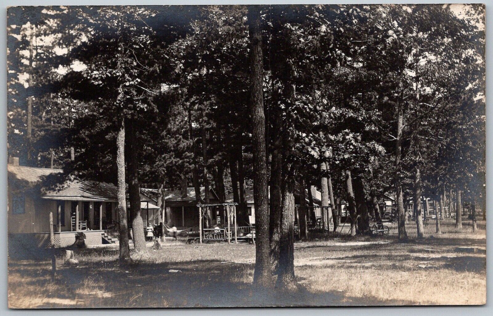 Higgins Lake Roscommon Michigan c1910 RPPC Real Photo Postcard Cabins
