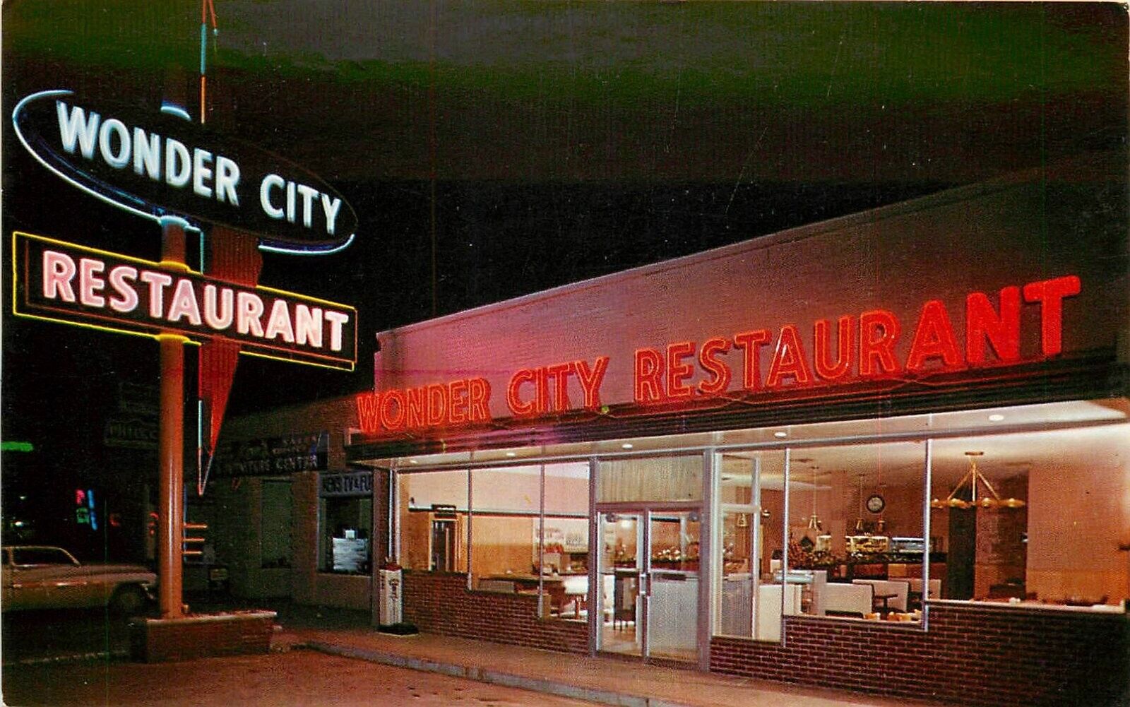 Postcard 1950s Arkansas West Memphis Wonder City Restaurant Night Neon 24-5456