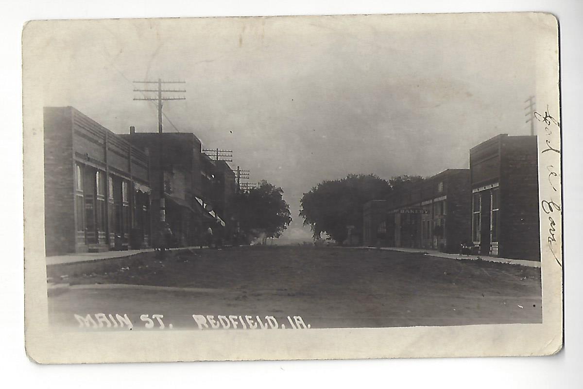 1911 Redfield, Iowa, Main St. RPPC