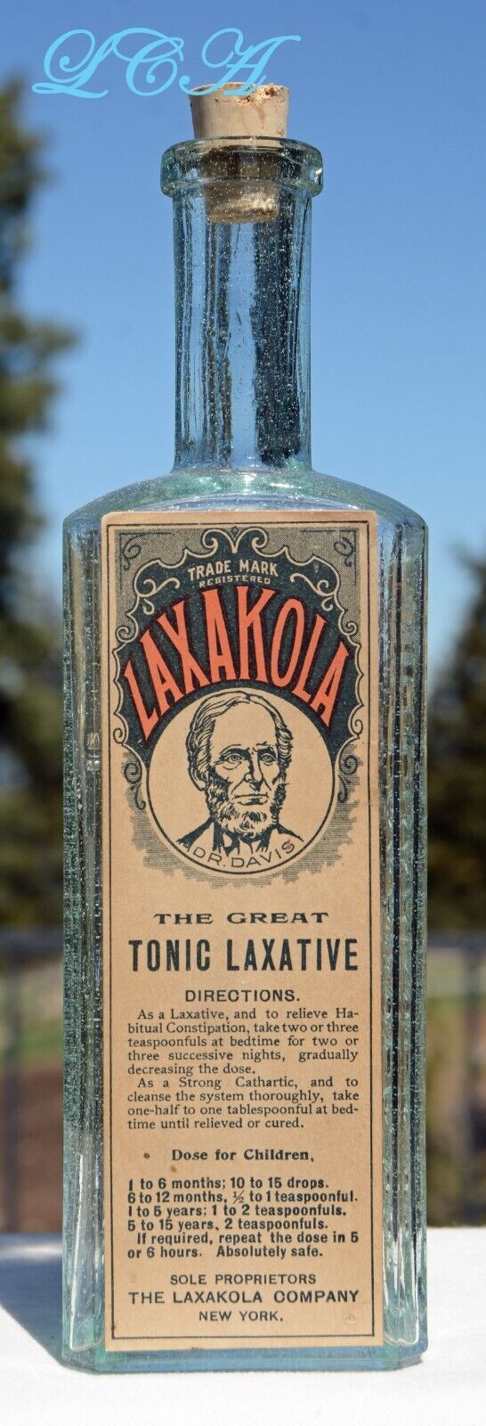 Antique GREAT TONIC LAXATIVE embossed & labeled QUACK medicine LAXAKOLA bottle