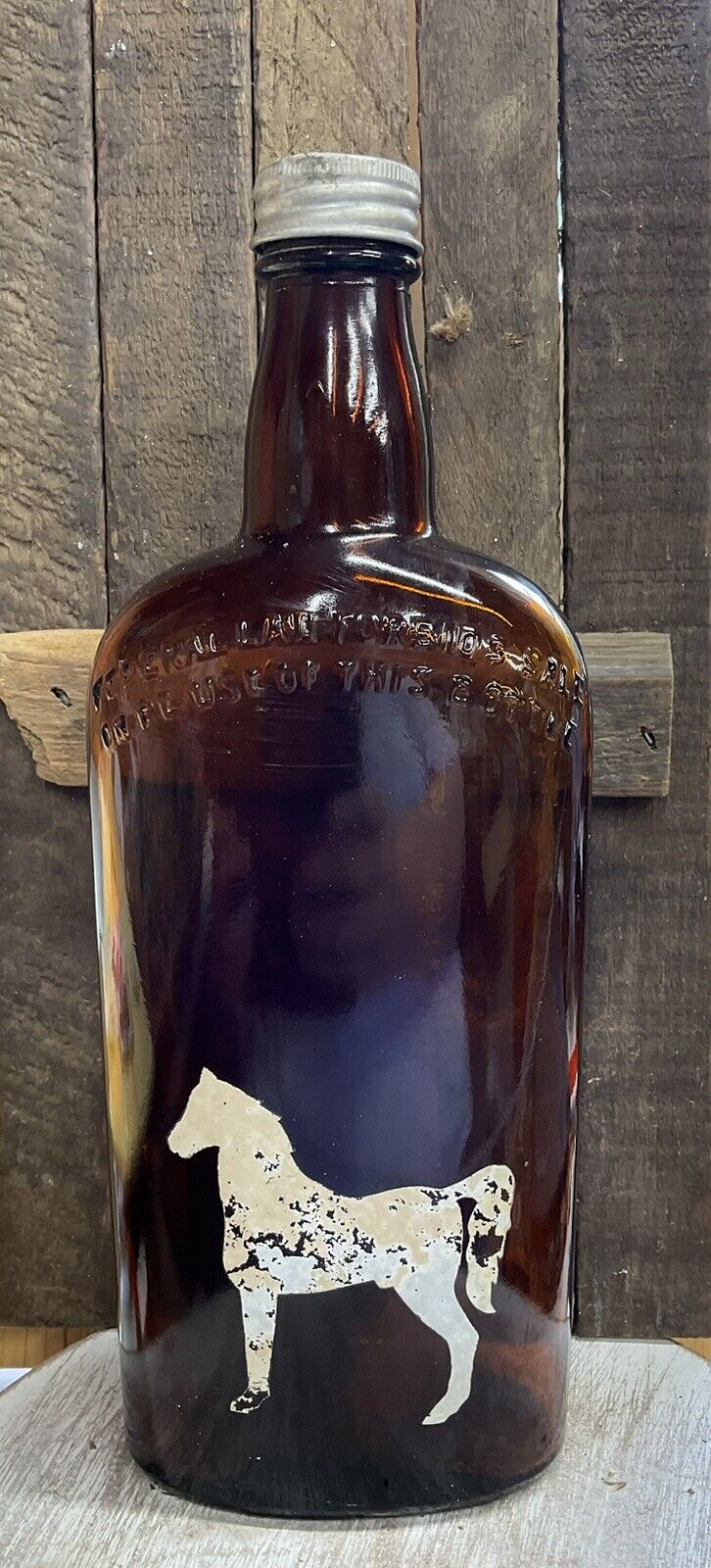 Vintage White Horse Distilleries glass whiskey bottle with original cap.