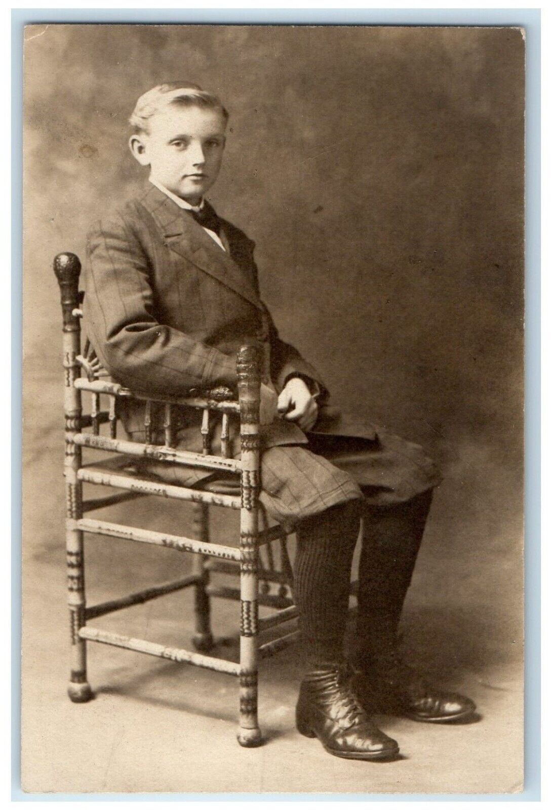 c1910\'s Handsome Boy Sat On Chair Studio Manchester VT RPPC Photo Postcard