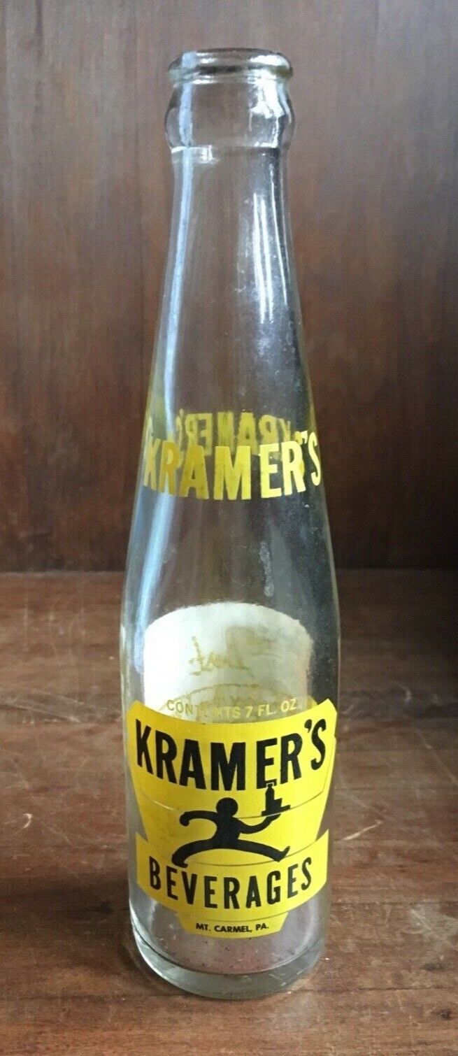 Vintage Kramers ACL beverage bottle. With Moxie overlabeling. 1975.