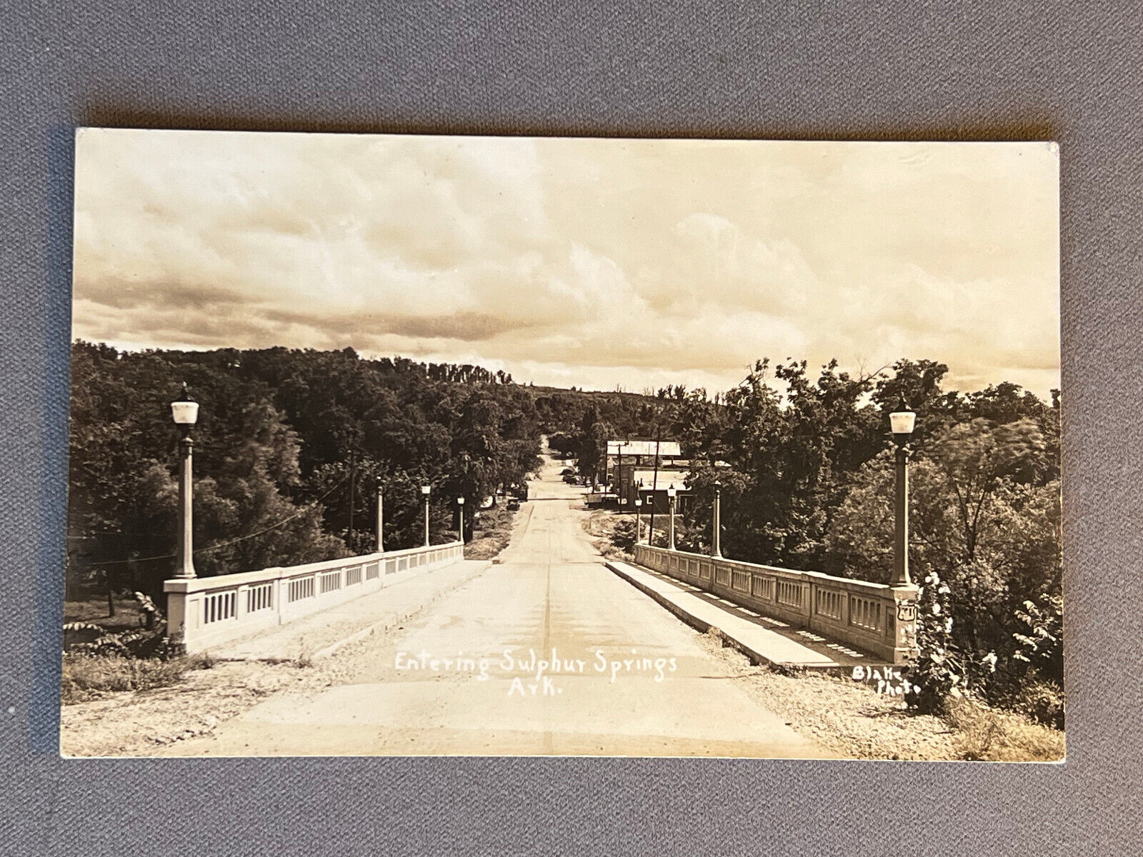 AR Arkansas RPPC, Entering Sulphur Springs Over Bridge, ca 1940