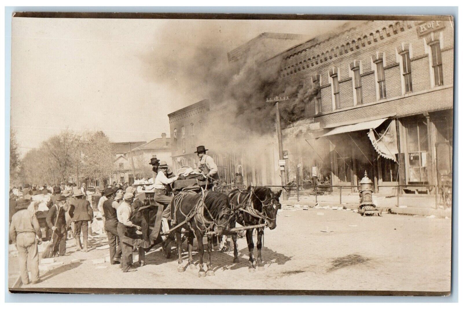 c1910's Candid Fire Disaster Downtown Block Horse Wagon RPPC Photo Postcard
