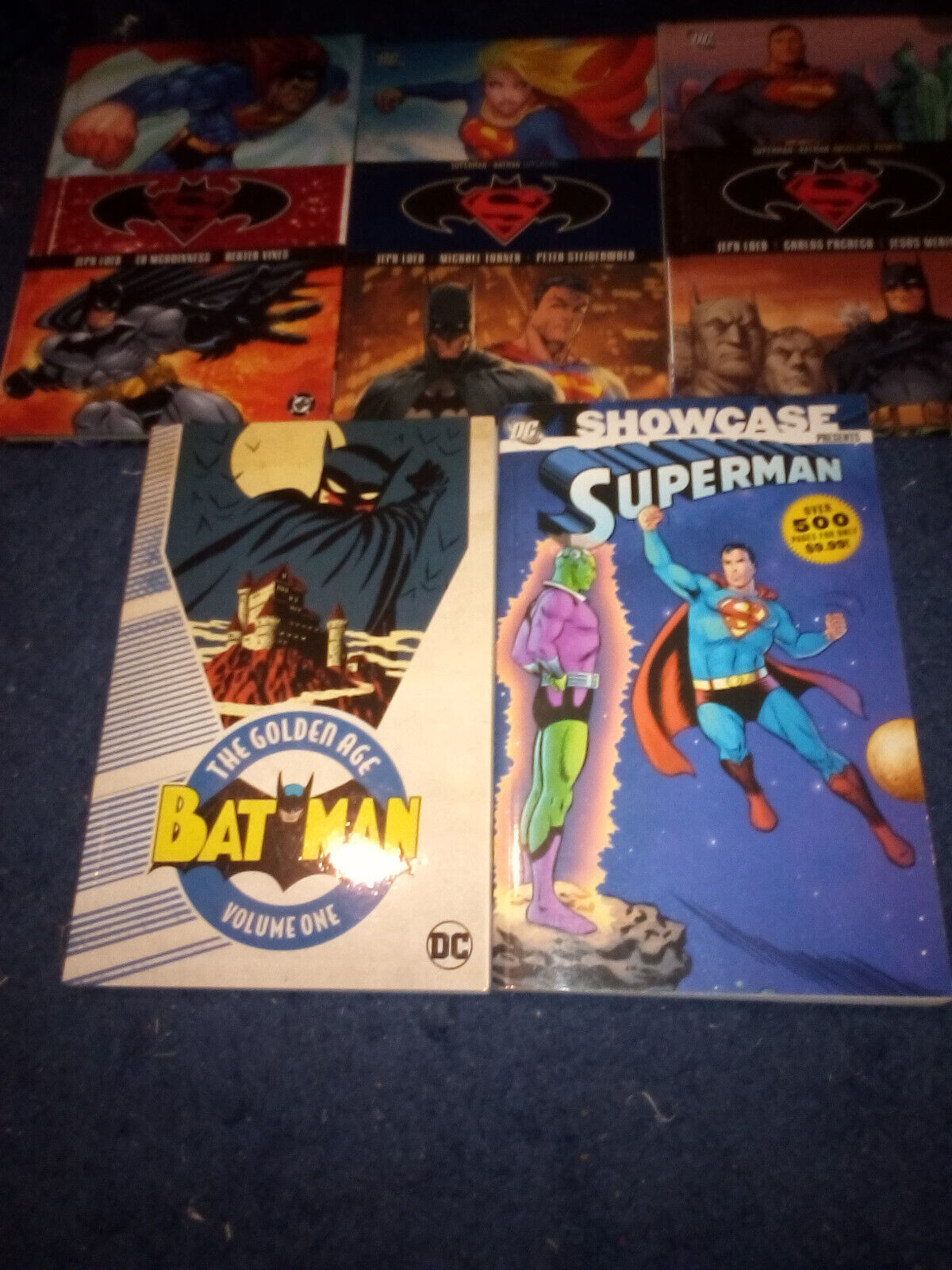 Superman/Batman vol.  1-3, Superman Showcase vol. 1, and Batman: The Golden Age.