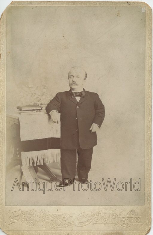 Man little person with books sideshow circus ? antique cabinet photo