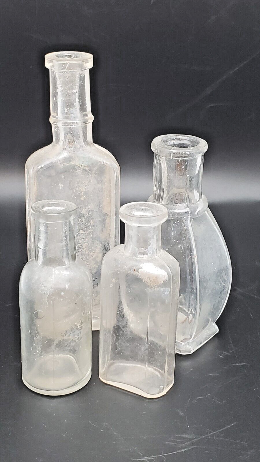4 Glass Antique Bottles Clear one Says Vail Bros.Philada Pa U.S. A.