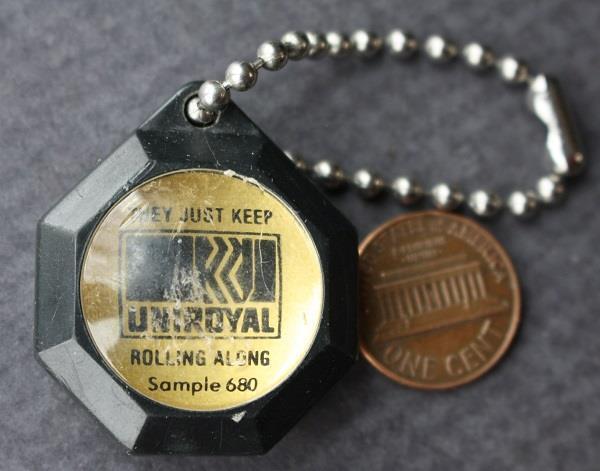 1970s Era Uniroyal Tires Directional Compass Keychain They Keep Rolling Along --