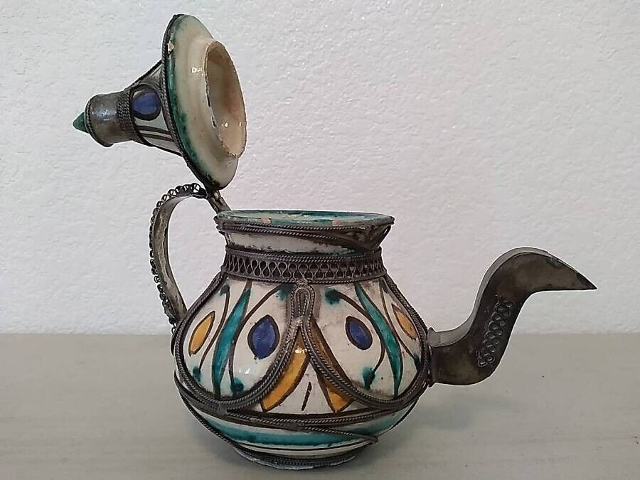 HAND CRAFTED CERAMIC W. METAL TEAPOT. H.7in