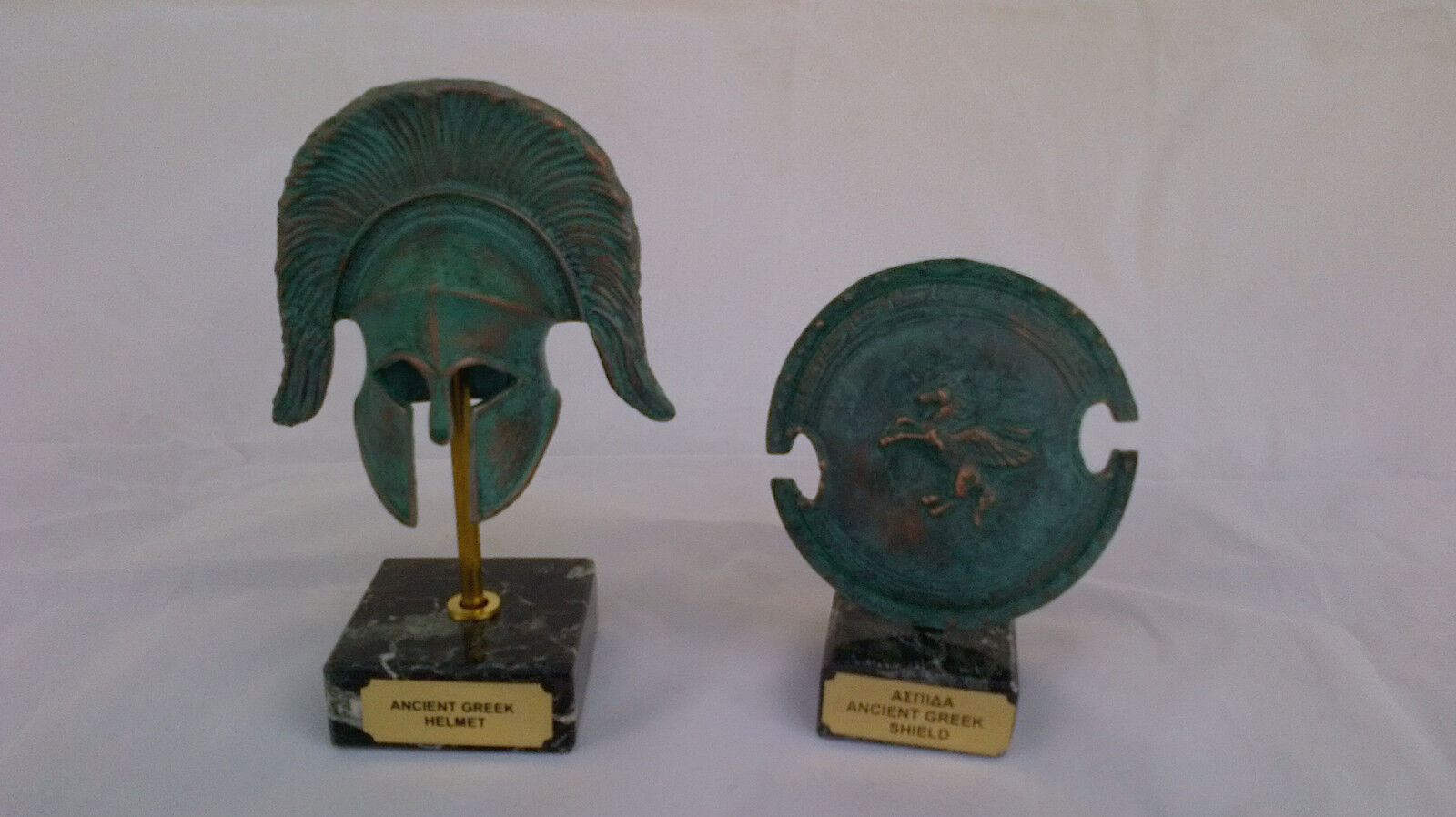 Helmet and Pegasus shield marble based clr-cpr/green artifacts