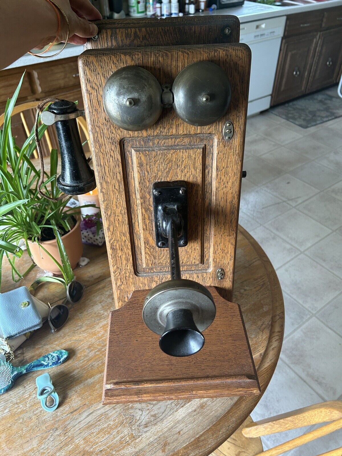 Antique wall telephone, dark brown finish, approx. 23”x 9.5” Depth-6”