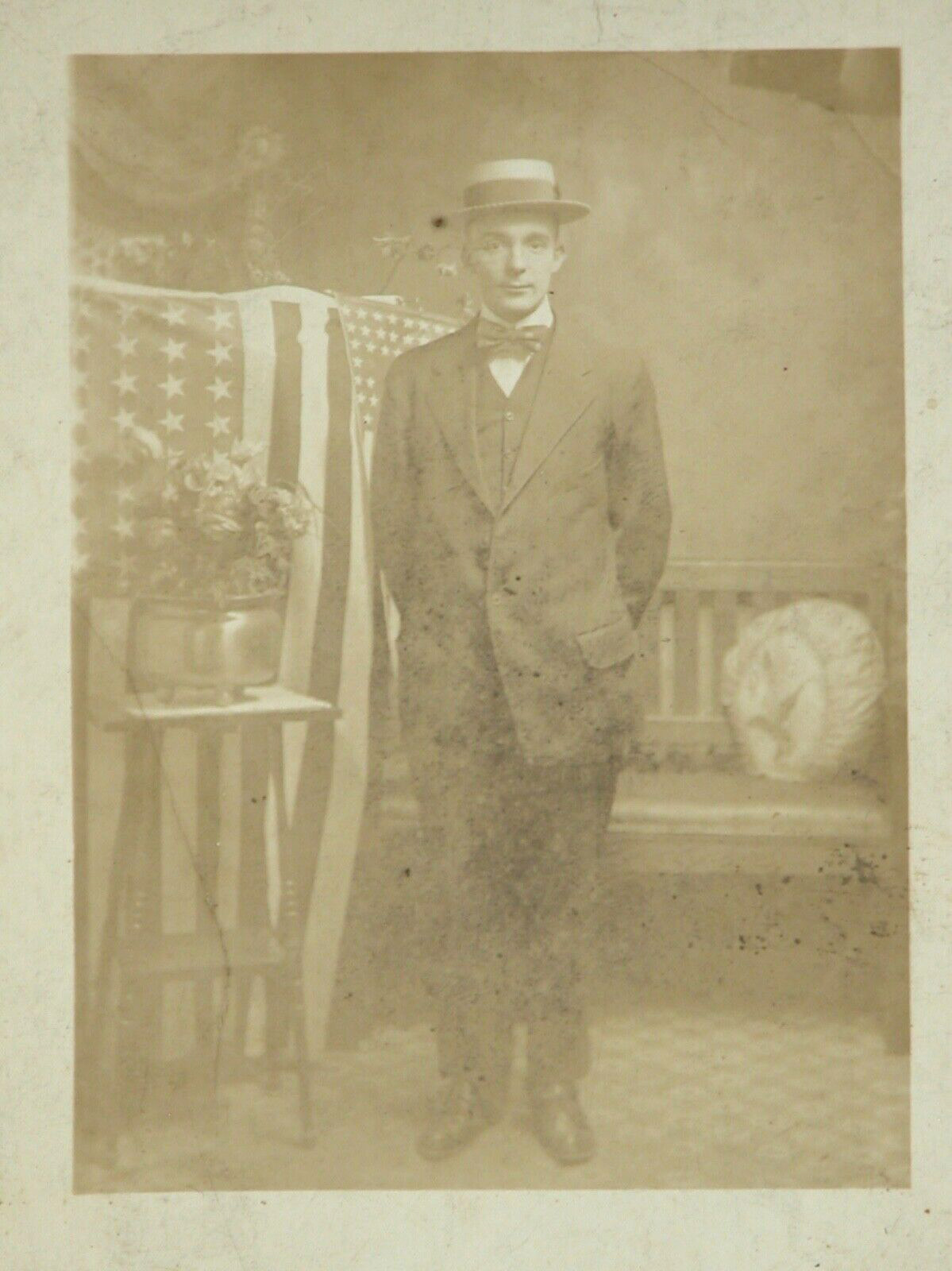 Vtg 1920s Photo Postcard Man Standing next to the American Flag NY RPPC
