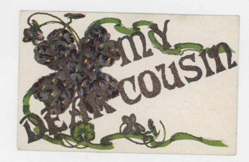 Vintage Postcard GREETINGS TO MY DEAR COUSIN   4 LEAF CLOVER  GLITTER  UNPOSTED