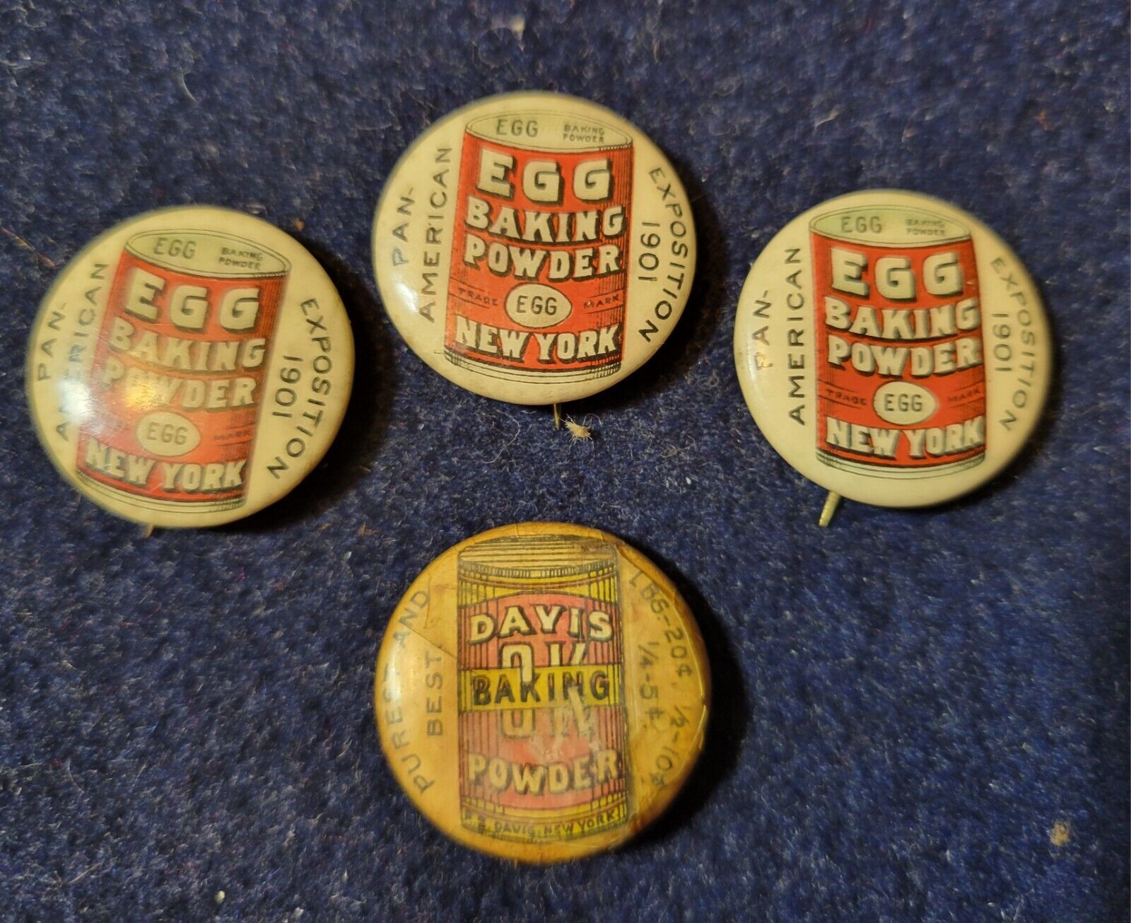4 EARLY PINBACKS DIFFERENT STYLES FOR BAKING POWDER.
