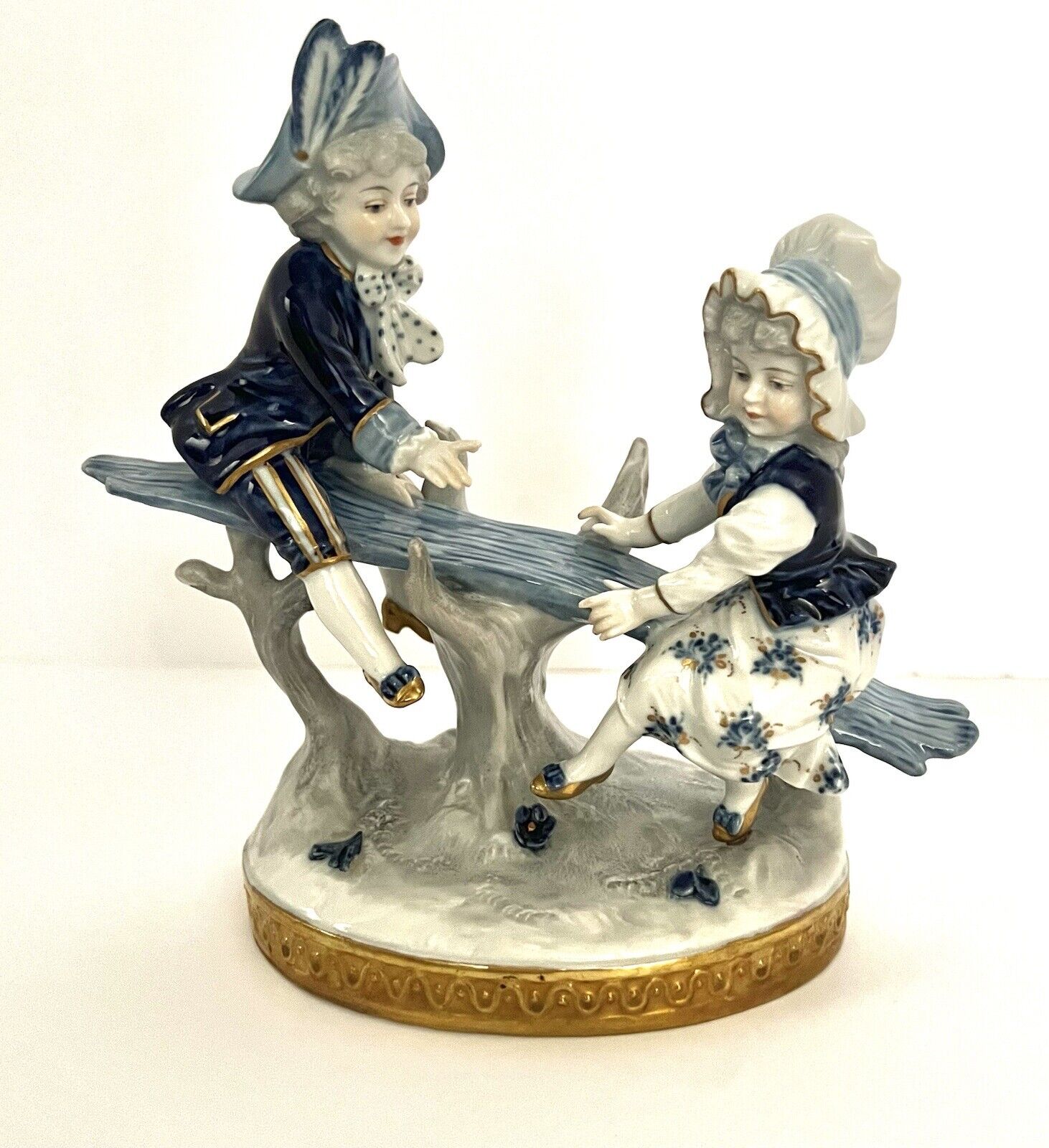Antique/Vintage German Volkstedt German Porcelain Boy/Girl Playing On A Seesaw.