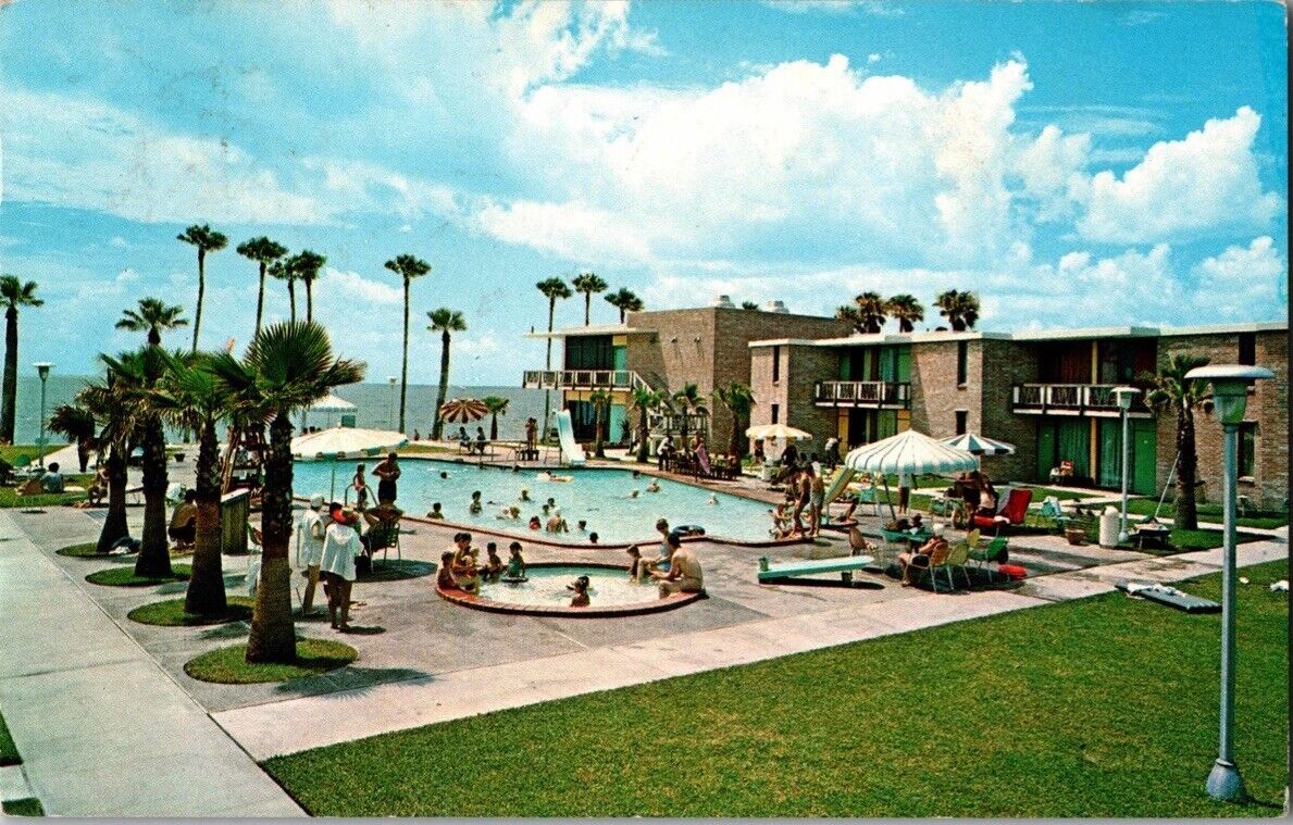 c1967 Sandy Shores Motor Hotel Corpus Christi Texas TX Palms Pool Beach Postcard