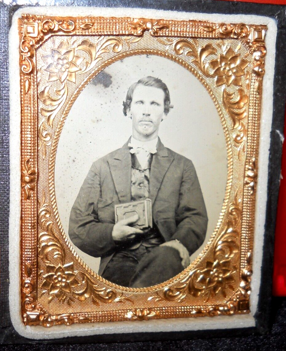 1/9th Size Tintype of young man in half case