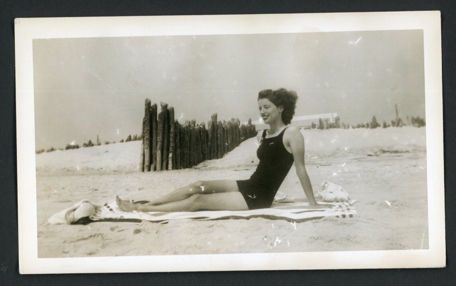 Smiling Swimsuit Woman Sunbathes on Windy Beach Photo 1940s Summer Legs Toes