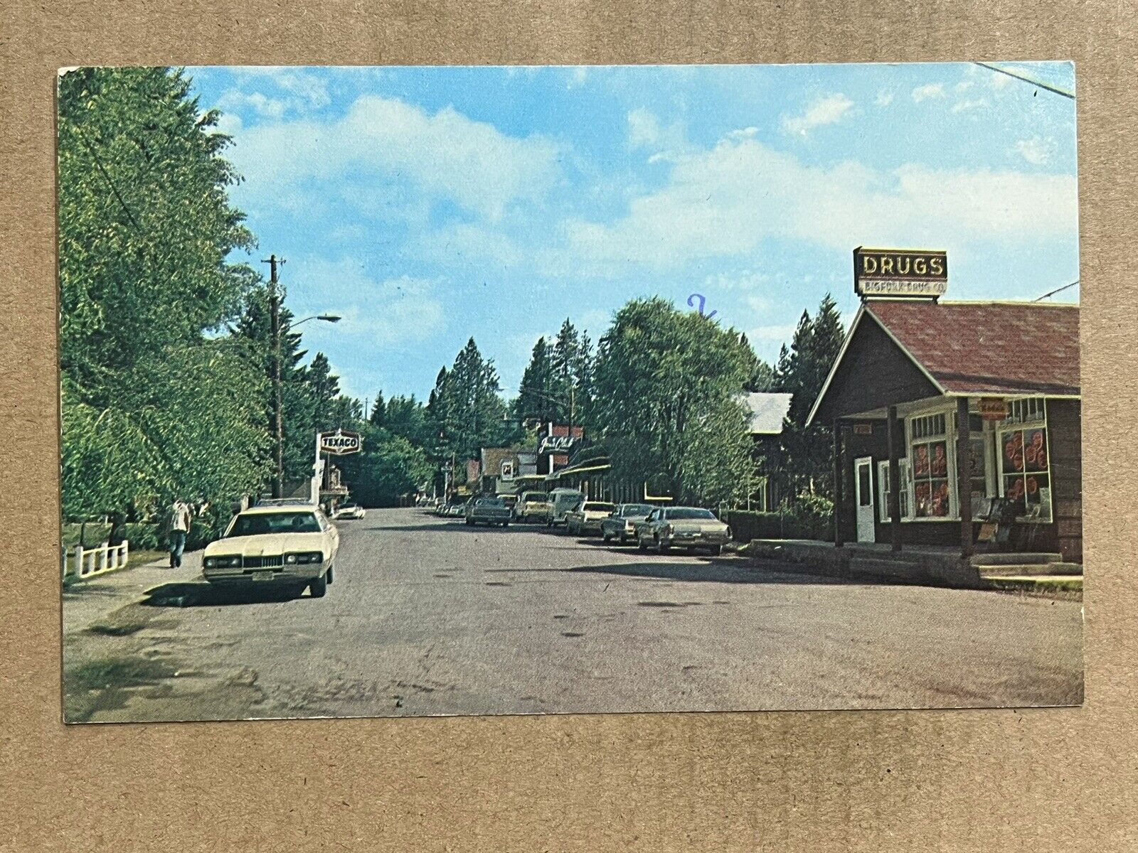 Postcard Bigfork MT Montana Drug Store Texaco Station Flathead Lake County