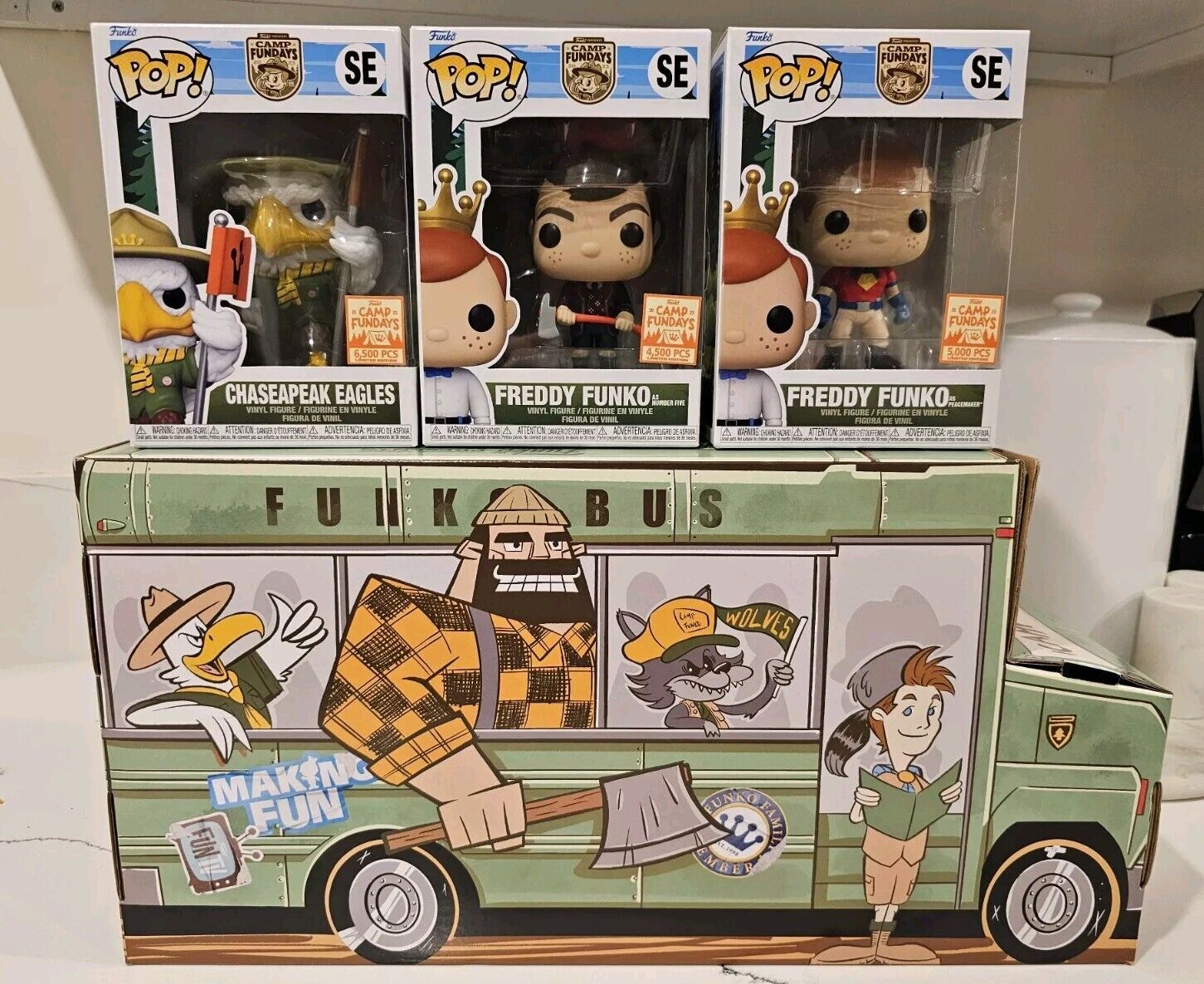 Funko Camp Fundays 2023 Box of Fun Eagles Freddy Funkos As Peacemaker & Number 5