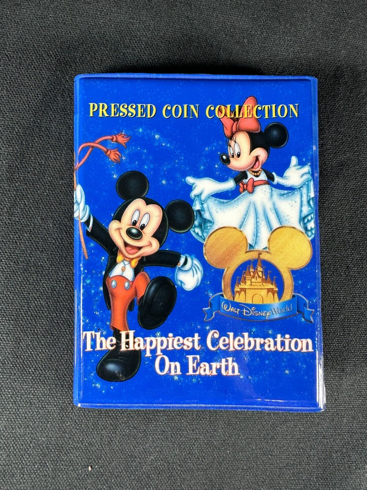 Disney pressed-squashed penny book Happiest Celebration on Earth