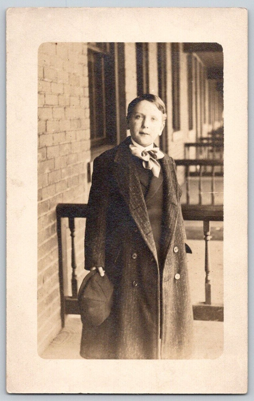 Antique RPPC Postcard~ Young Boy In Large Overcoat Holding His Hat