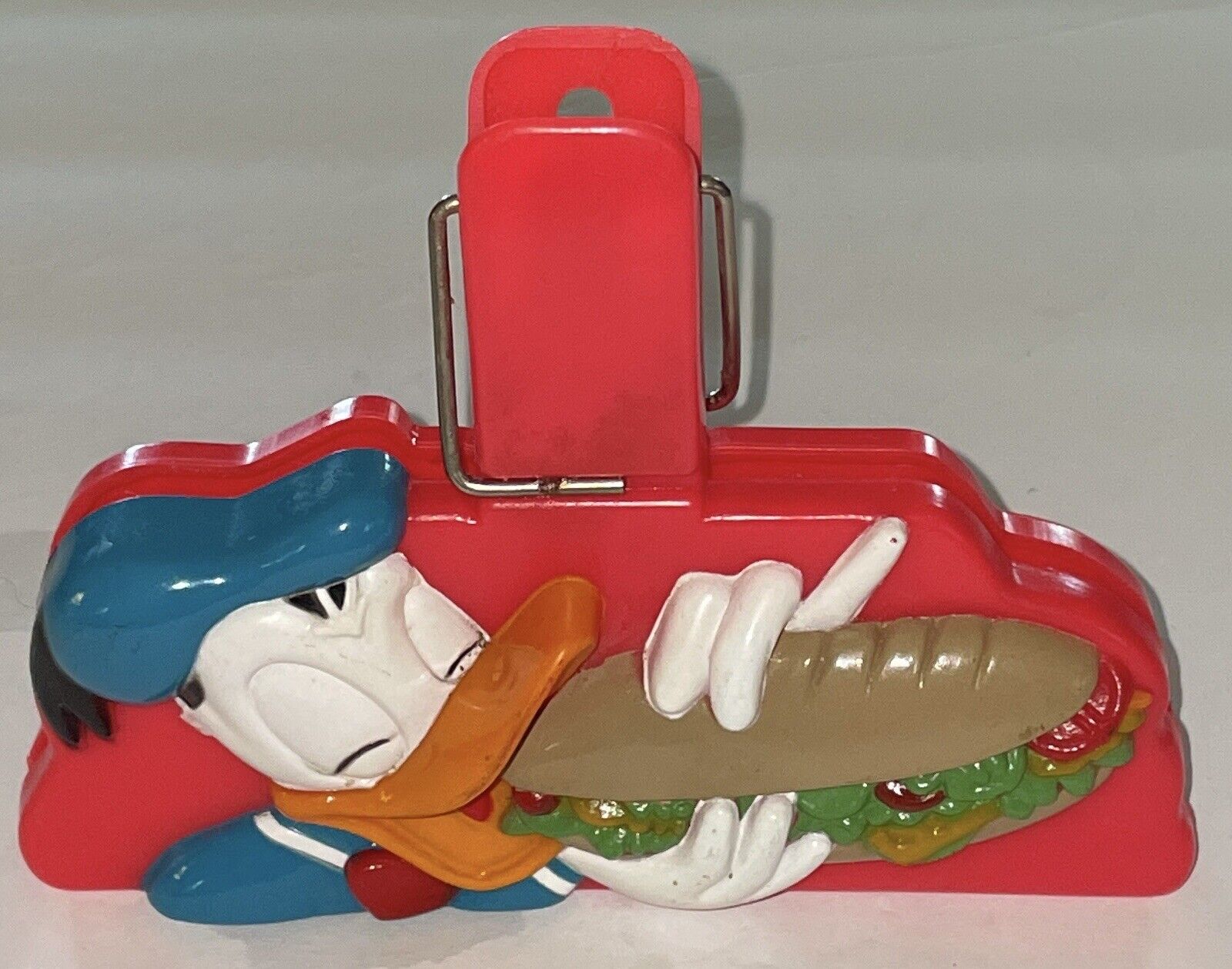 Vintage Donald Duck Eating Sub Submarine Sandwich Disney Red Plastic Bag Clip