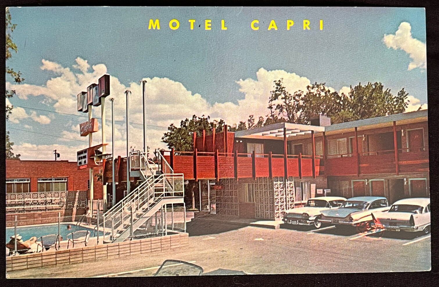 Reno Roadside Motel Capri Swimming Pool Old Cars Nevada Vintage Postcard c1950