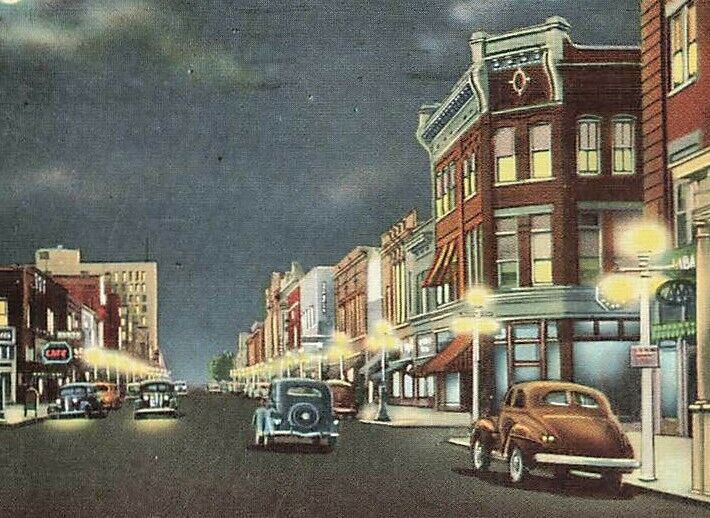 c1940 Noble Street Night Scene Cars Stores Anniston  AL P365