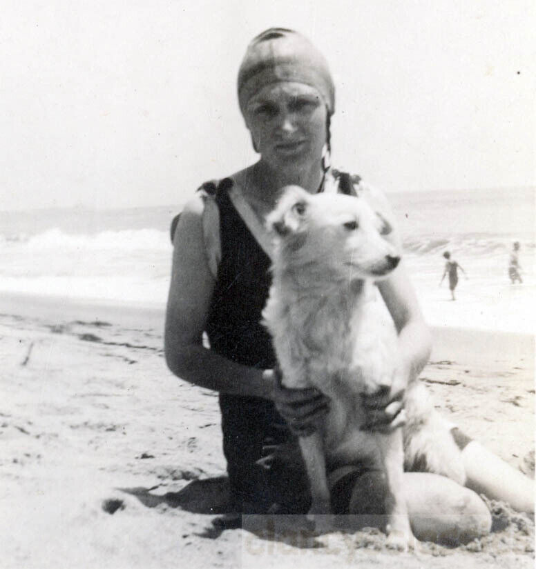 1922 Lovely White Dog with Bathing suit Woman at Beach