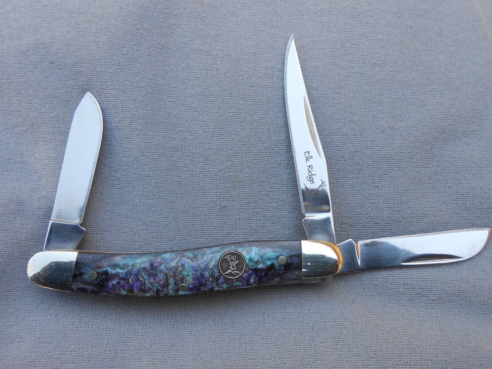 ELK RIDGE 440 STAINLESS SERPENTINE PREMIUM STOCKMAN KNIFE ALBALONE HANDLE?