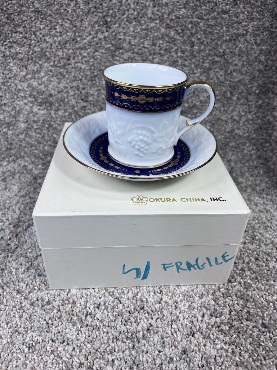 Okura China Cup and Saucer set - white blue & gold ornate design tea coffee set