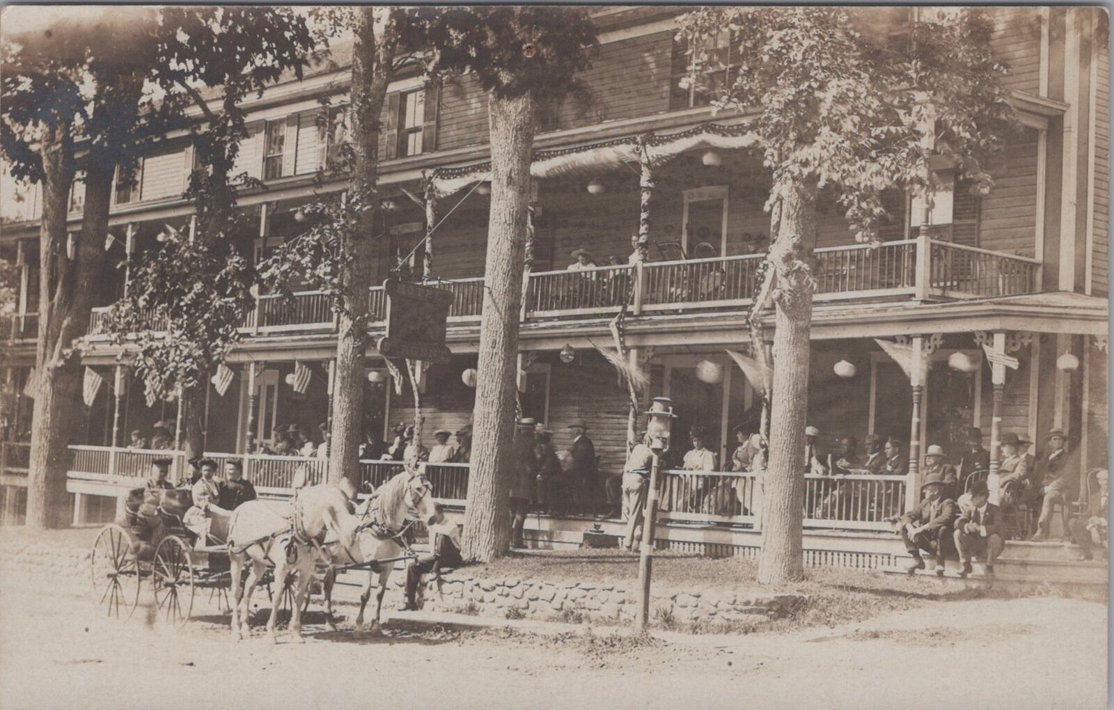 Hotel Sargent Crowded Porch US Flags New Hampshire Warren Photo RPPC Postcard