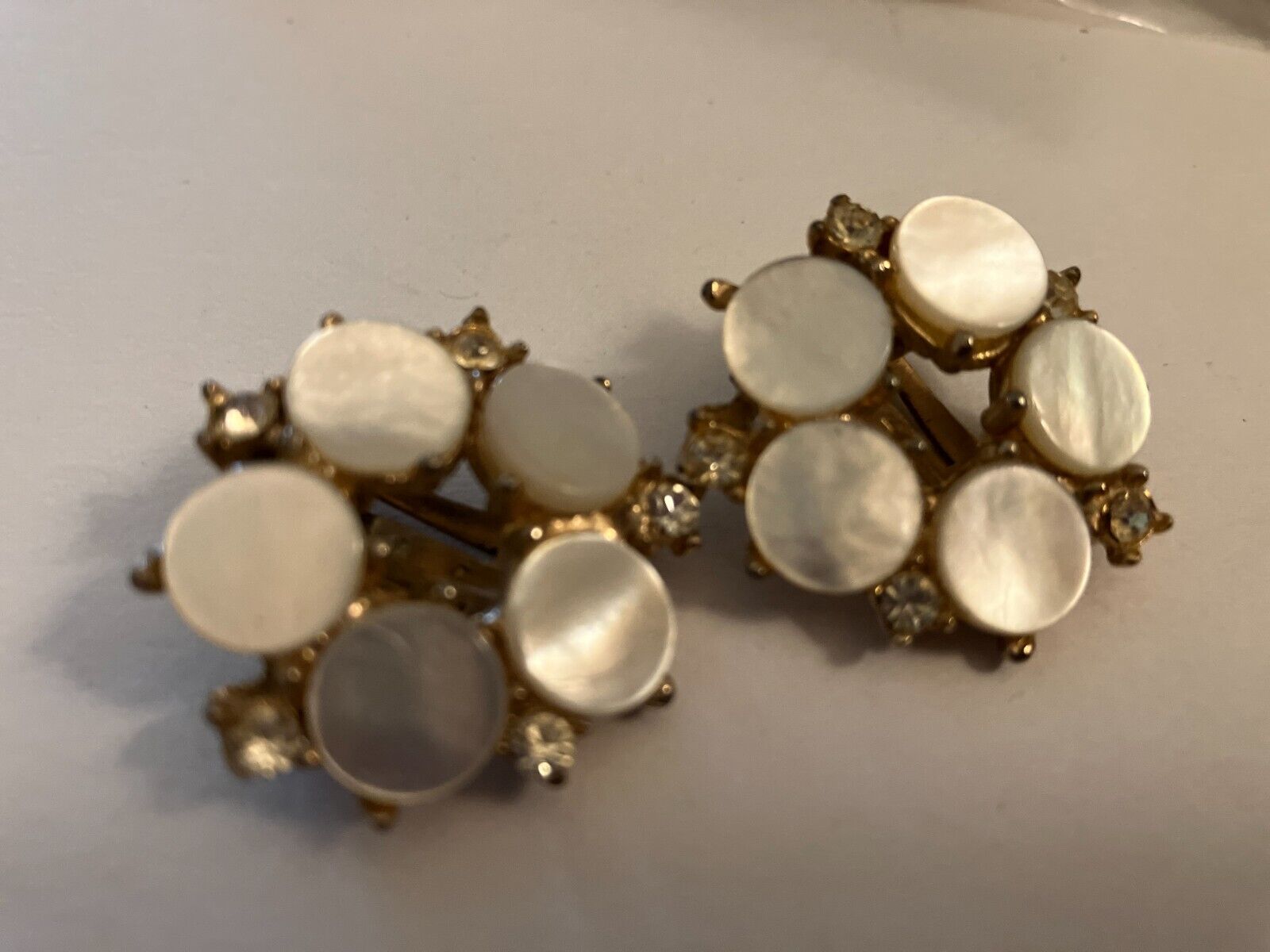 VINTAGE ESTATE rhinestone and mother of pearl button clip on earrings