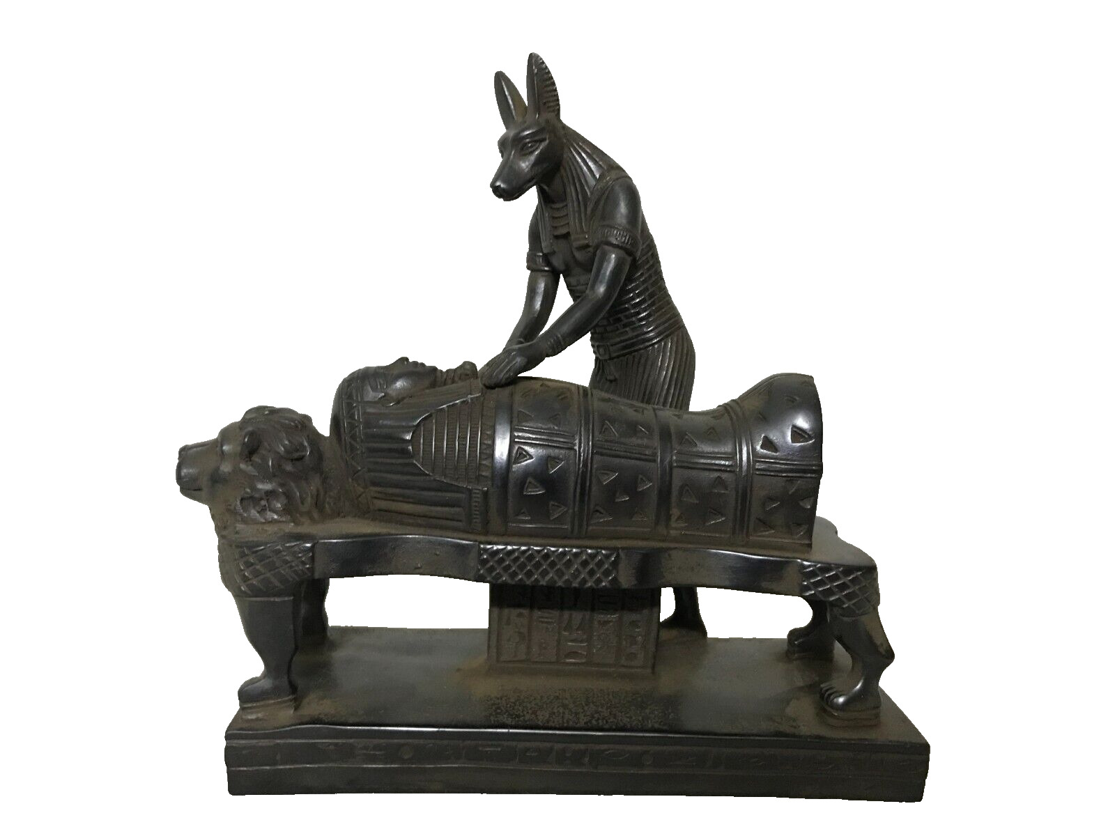 A rare statue of the ancient god Anubis mummifying the dead for the afterlife