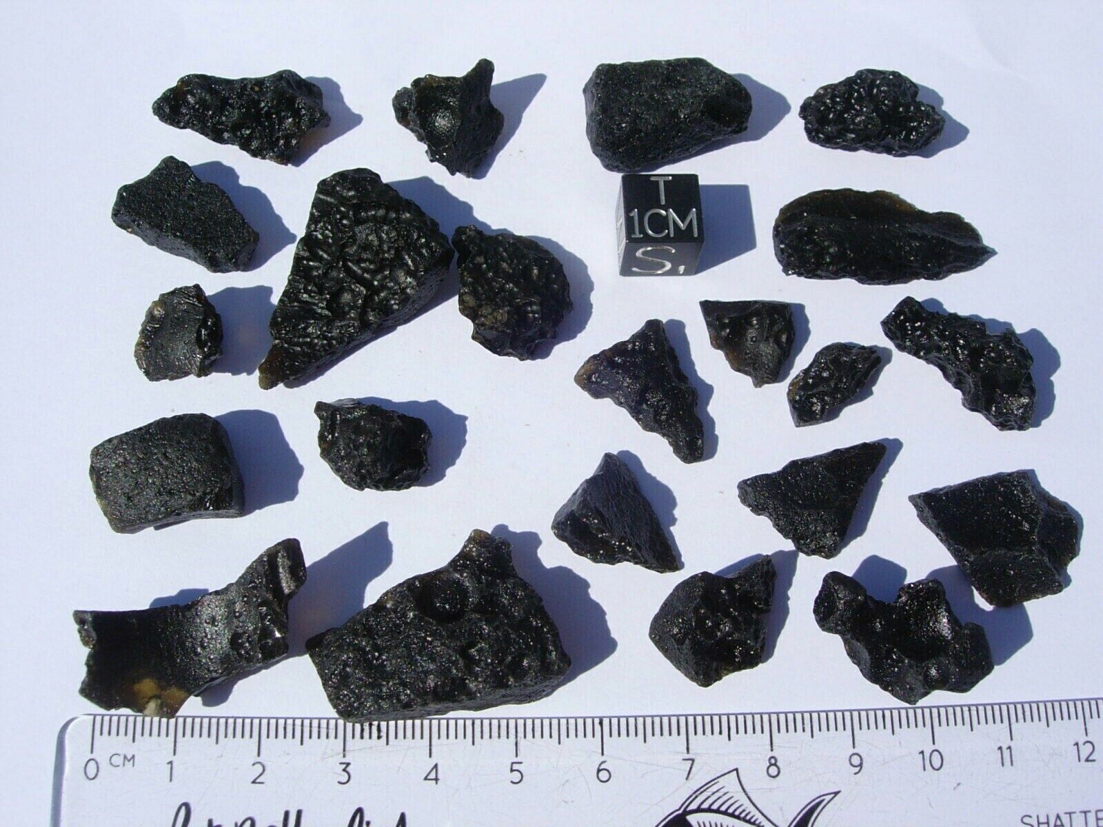 47.5 grams for all the TEKTITES from meteorite Impact comes with a COA 