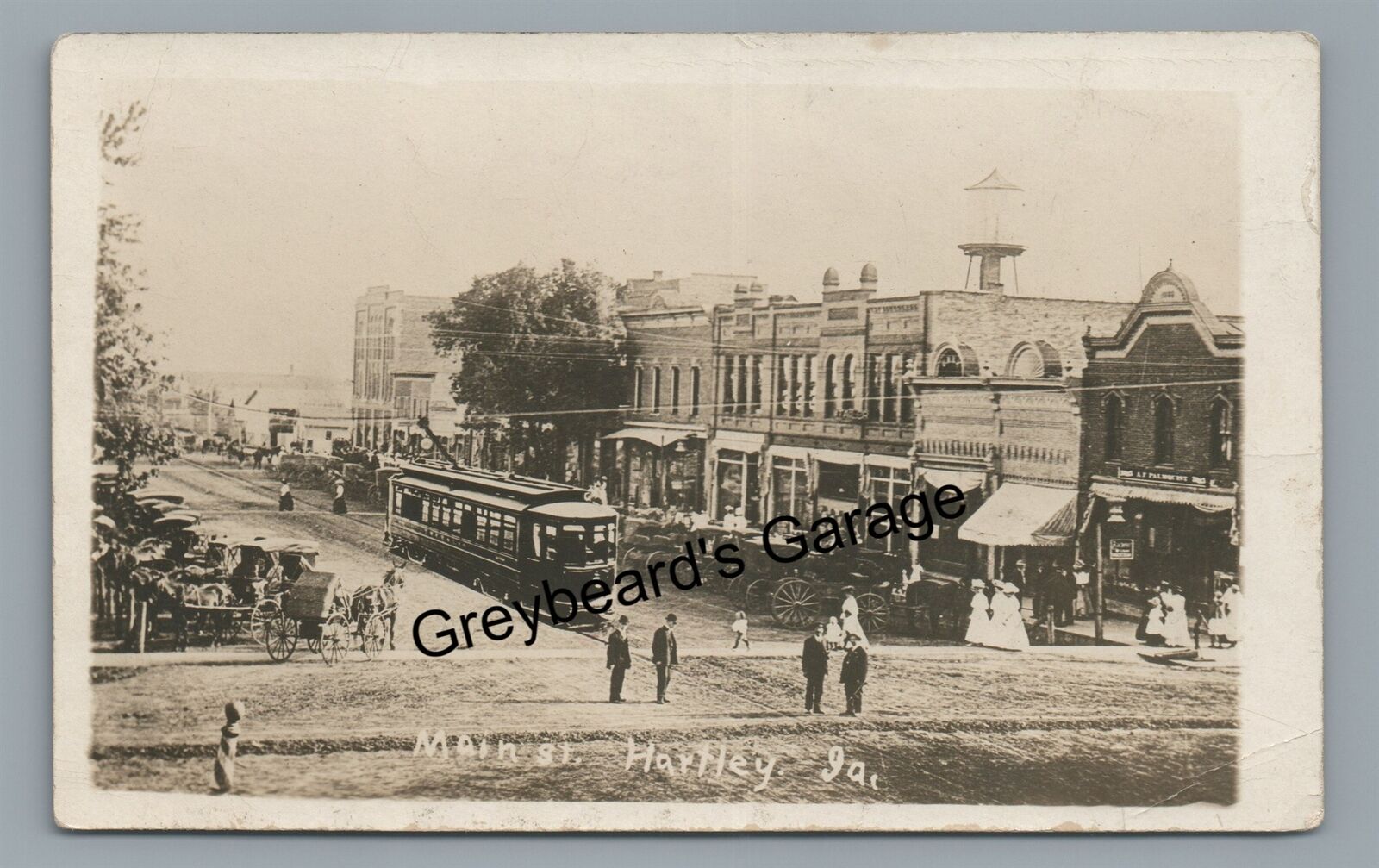 RPPC Added Trolley Main Street HARTLEY IA 1911 Iowa Real Photo Postcard
