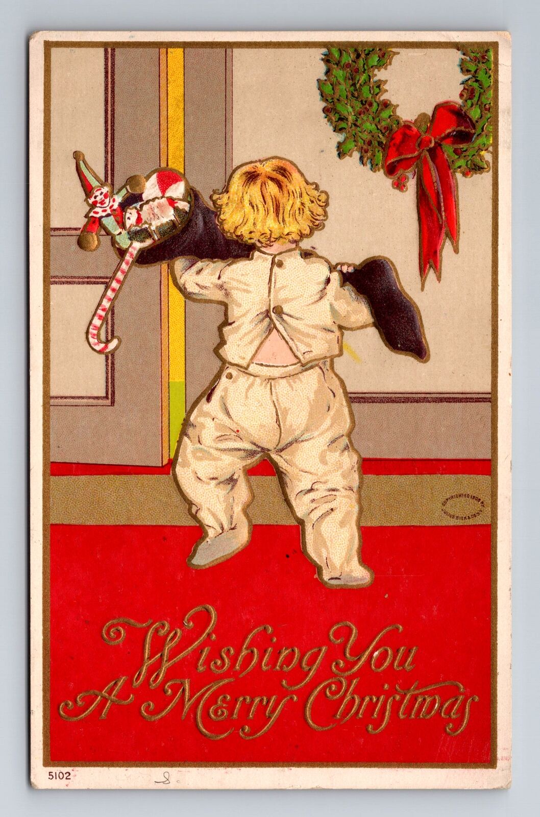 Wishing You A Merry Christmas, Child With Presents Embossed Vintage Postcard