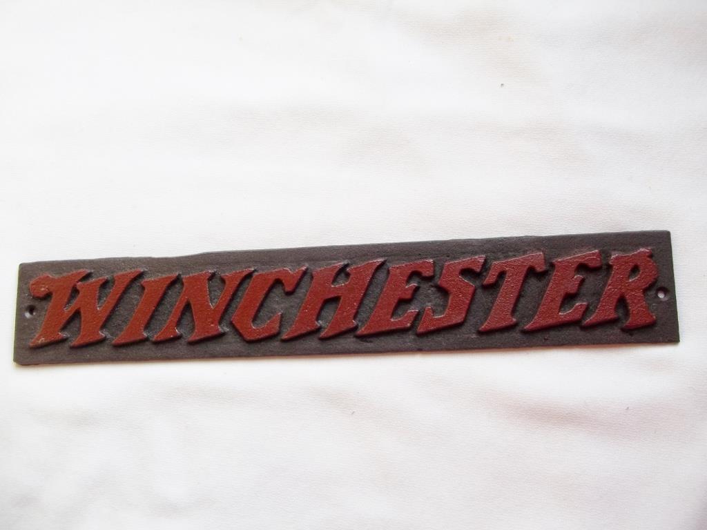 CAST IRON WINCHESTER GUN ADVERTISING SIGN PLAQUE WITH RAISED LETTERS