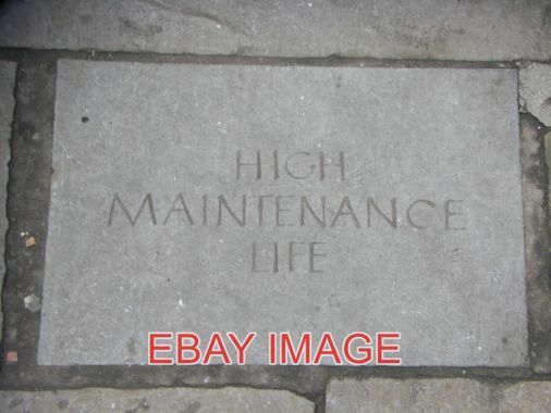 PHOTO  CAMBRIDGE HIGH MAINTENANCE LIFE THIS ENGRAVED PAVING SLAB MYSTERIOUSLY AP