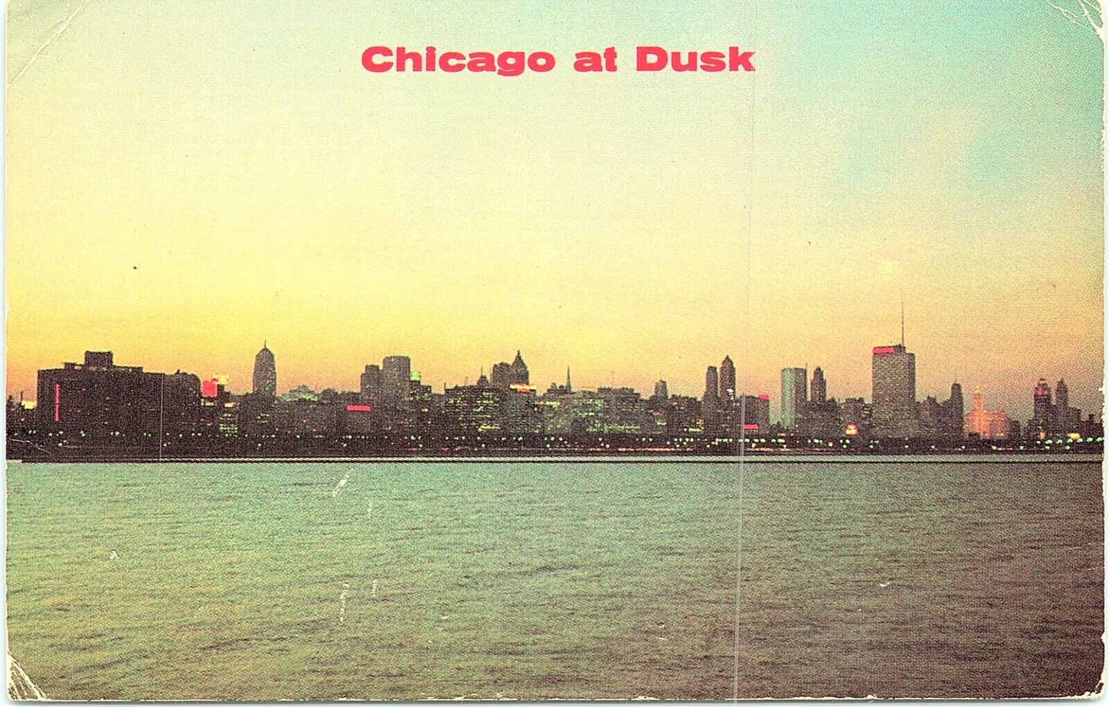 VINTAGE 1960\'S POSTCARD -DOWNTOWN CHICAGO SKYLINE AT DUSK LAKE MICHIGAN