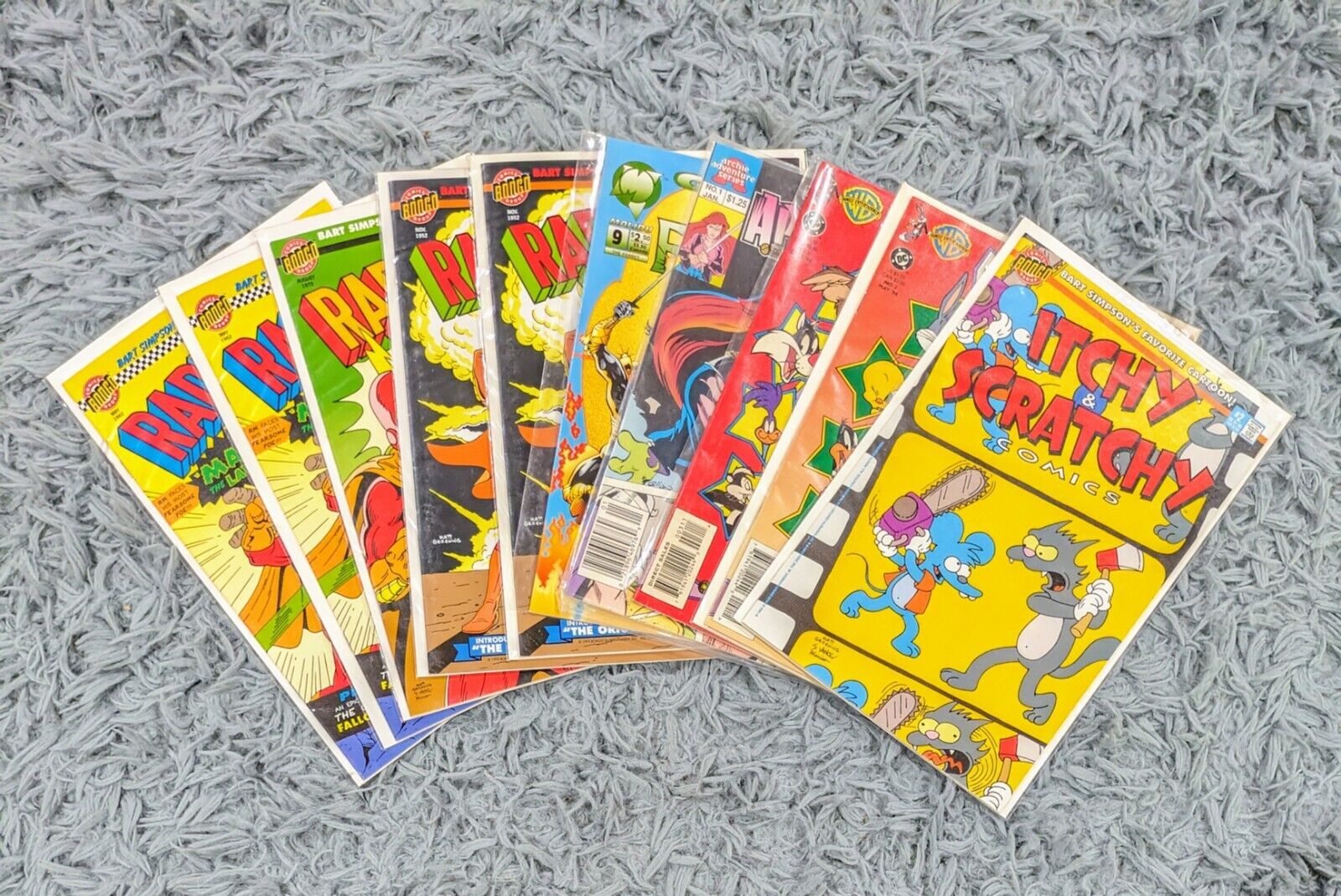 Lot of 10 Assorted Comic Books- Itchy & Scratchy, Looney Tunes, Radioactive Man
