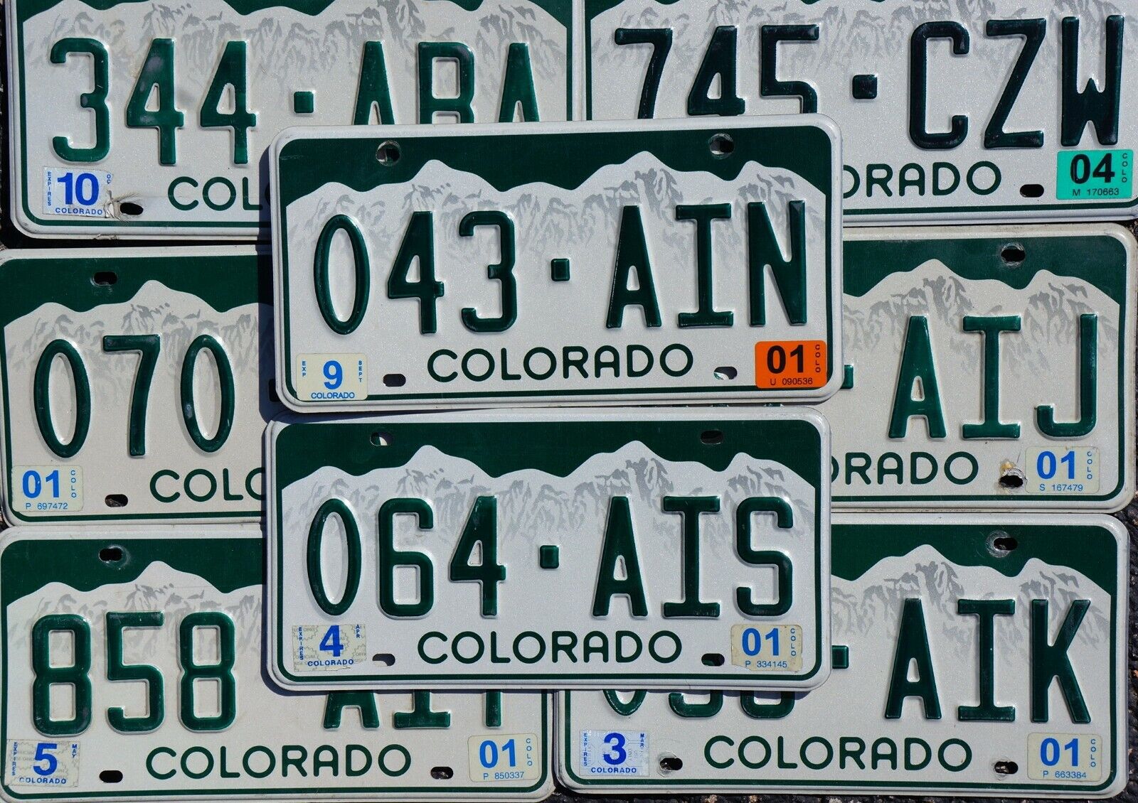 ONE or MORE - COLORADO SNOW MOUNTAINS License Plate 