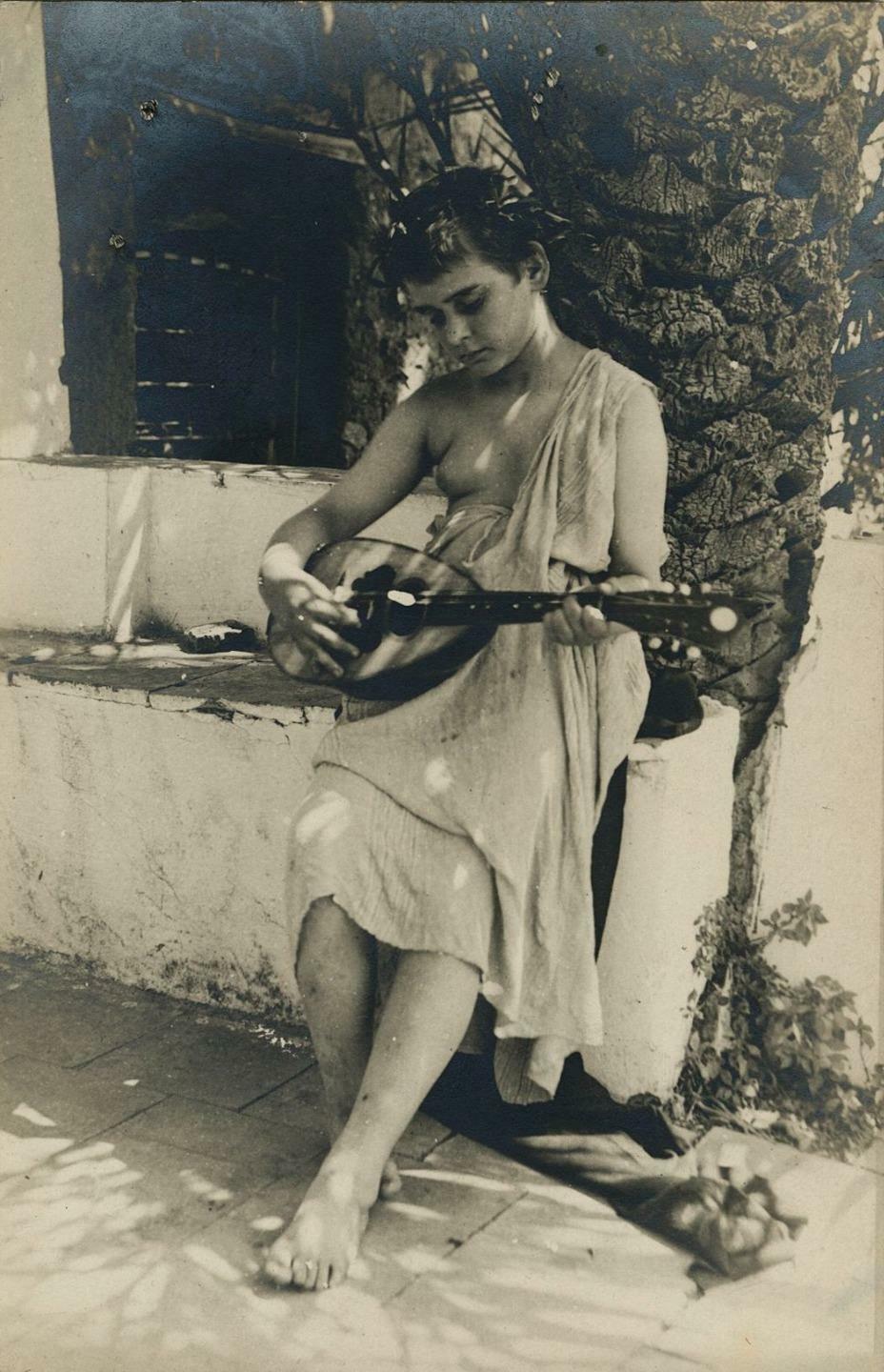 c. 1900 Boy Playing Mandolin Real Photo Postcard by Wilhelm von Gloeden