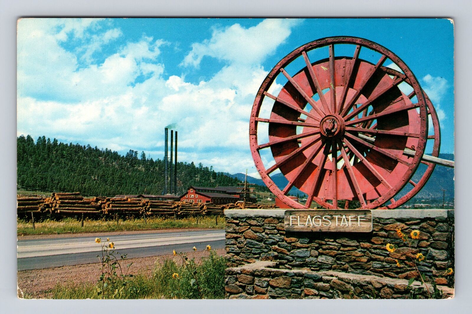 Flagstaff AZ-Arizona, Giant Logging Wheels at Western Entrance, Vintage Postcard