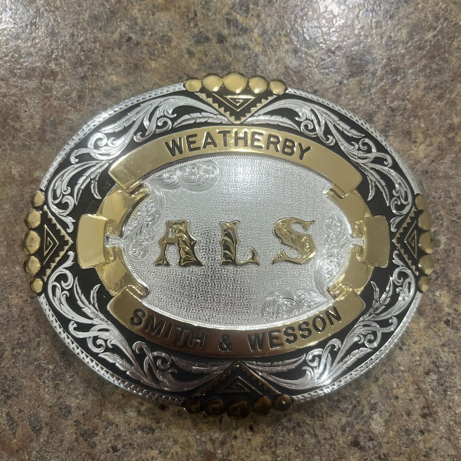Montana Silversmiths Belt Buckle Weatherby ALS Smith & Wesson Silver Gold